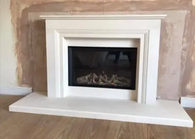 Fireplace surround and fire