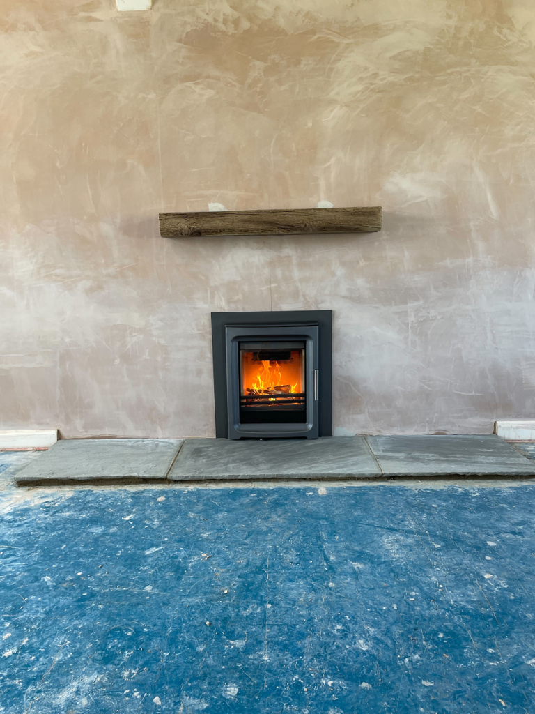 Purevision PVi5 inset stove 5kw Purevision PVi5 inset stove 5kw Grey stove hearth.