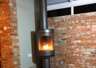 Woodburning cylinder stove_Fireplace Finesse