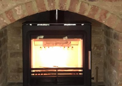 Fireplace Finesse Purevision PV5 wide 5kw stove in black.